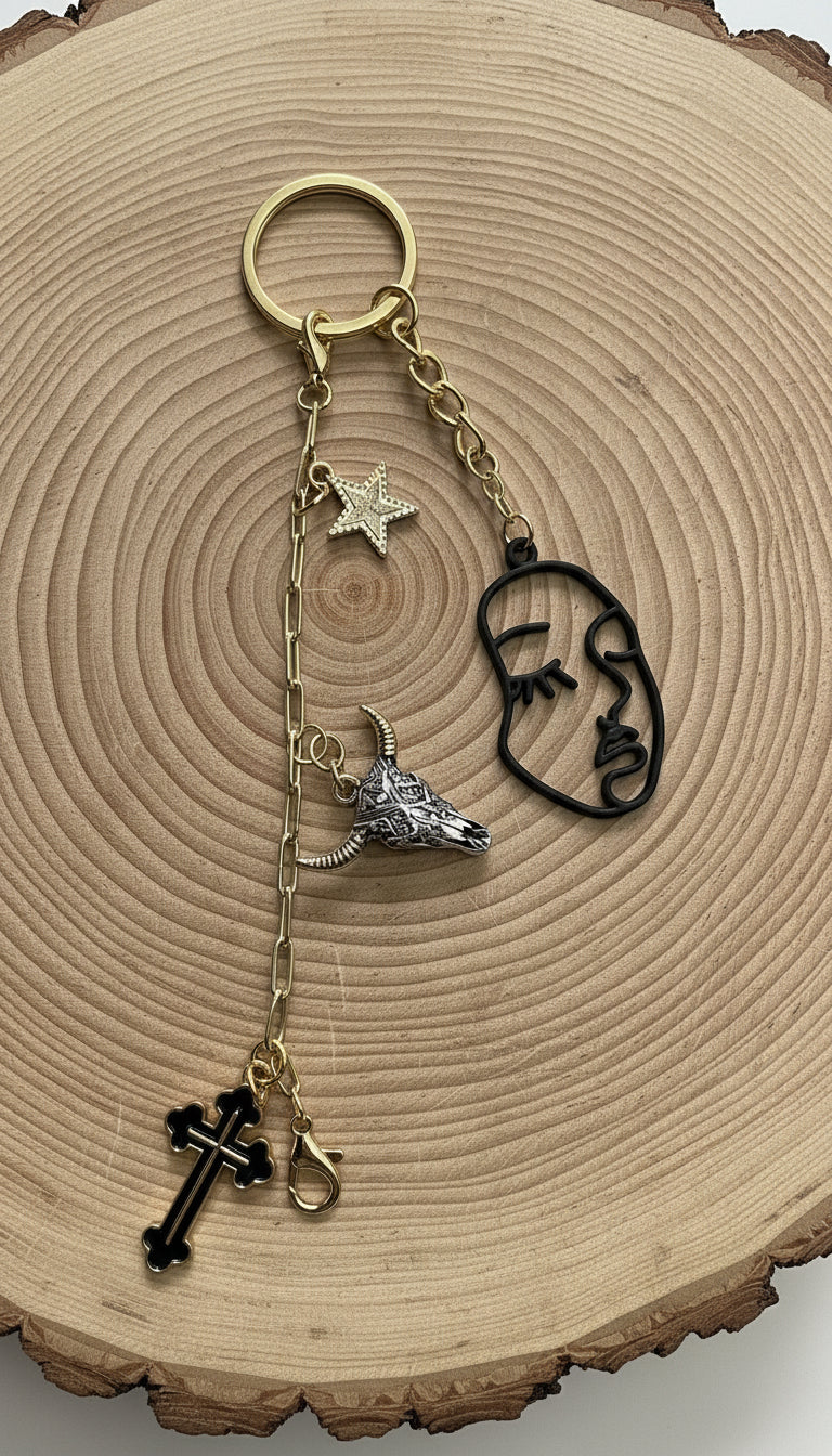 Modern Cowgirl
This one-of-a-kind keychain is handcrafted with enamel charms and a gold-plated, nickel-free chain. Designed as a statement of grounded strength and intuitive protection, each symbol was intentionally chosen to reflect independence, faith, and inner knowing.
✨ Details:
• Enamel charms
• Gold-plated chain
• Nickel-free
• 1 of 1 – only one available
A modern talisman for the soul who walks its own path.